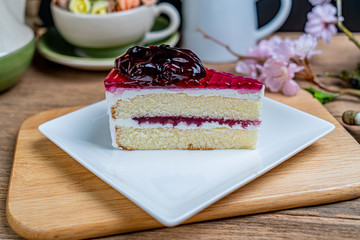 Blueburry cake on white ceramic plate