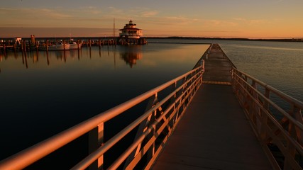Fototapeta na wymiar Looking down gangway during Dawn with Choptank River Lighthouse on the right