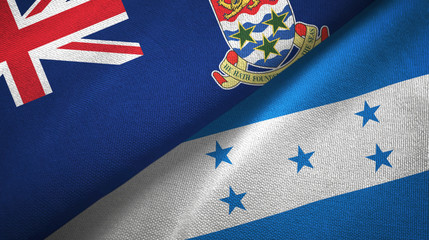 Fototapeta premium Cayman Islands and Honduras two flags textile cloth, fabric texture