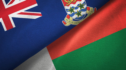 Fototapeta premium Cayman Islands and Madagascar two flags textile cloth, fabric texture