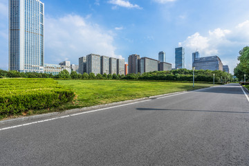 empty road front of modern buildings