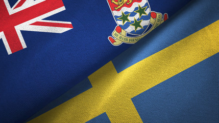 Cayman Islands and Sweden two flags textile cloth, fabric texture