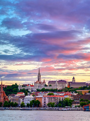 Fototapeta premium The Buda side of Budapest, Hungary along the Danube River at sunset.