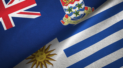 Cayman Islands and Uruguay two flags textile cloth, fabric texture