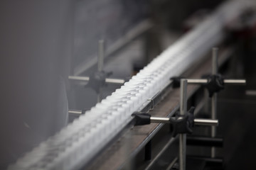 Pill bottles on pharmaceutical production line