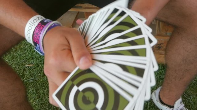 Portugal - Man Doing Card Tricks With His Hands In Slow Motion - Close-up Shot