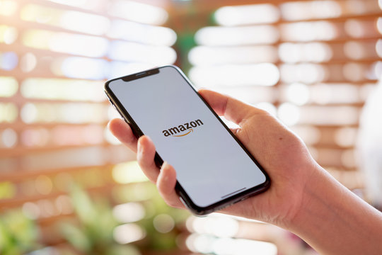 CHIANG MAI, THAILAND, JUL 27, 2019 : iPhone Xs showing Amazon logo shopping online. Amazon.com, Inc. American international electronic commerce company.