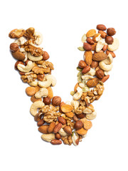 Letter V of the English alphabet from a mixture of hazelnuts, almonds, walnuts, peanuts, cashews, pumpkin seeds on a white isolated background. Food pattern made from nuts. Bright alphabet for shops.