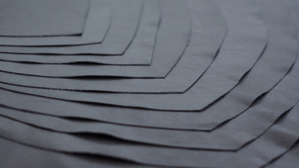 Tier Layered black leather textured background wallpaper