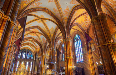 Fototapeta premium Budapest, Hungary - May 24, 2019 - The interior of the Church of the Assumption of the Buda Castle, more commonly known as the Matthias Church, located in Budapest, Hungary.