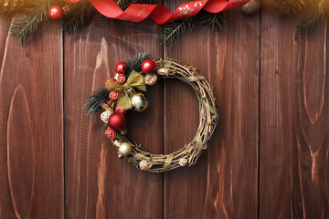 christmas wreath on wooden door