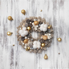 beautiful Christmas wreath on wooden background. preparation for Christmas