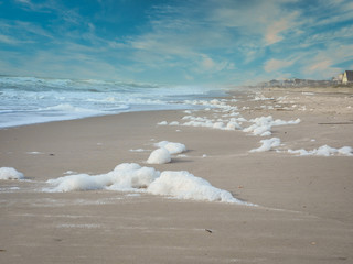 seafoam on the beach
