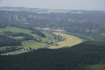 Fototapeta na wymiar Kurort Rathen from Lilienstein mountain with fields and Elbe river