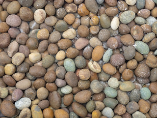 pebble stone background, small Scree in garden with difference color, abstract background.