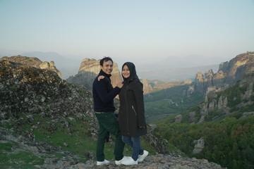 couple traveller enjoying the view from kalampaka hills, Greece