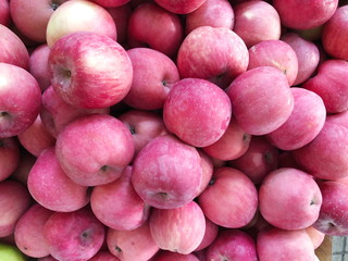 Fresh pink ripe apples as background