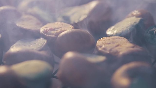 snails are cooking on grill
