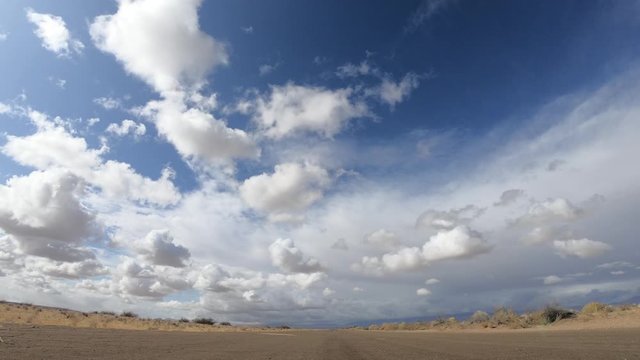 Cloud Time Lapse over Empty Desert Plain in California