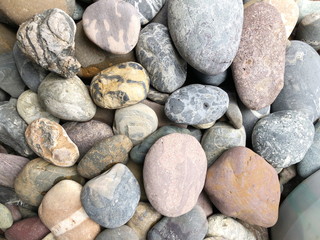 Abstract smooth round pebbles sea texture background