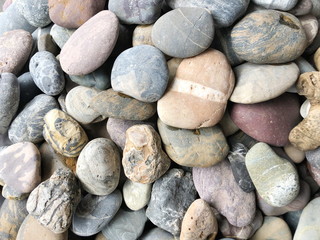 Abstract smooth round pebbles sea texture background