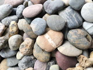 Abstract smooth round pebbles sea texture background