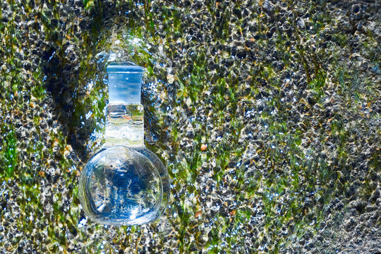 Glass flask with clear water.