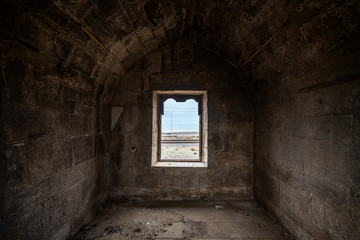 Window in an ancient abandoned house