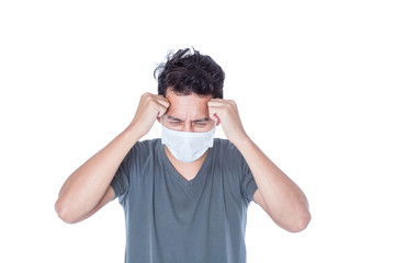 A sick man wear hygienic mask and headache.