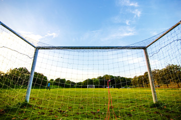 goal football in the park with a sunlight.