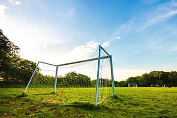 goal football in the park with a sunlight.