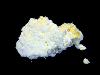 cottage cheese isolated on black background
