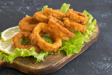 squid rings deep fried with crispy crust.