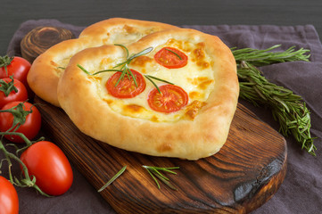 pizza Margarita in the shape of a heart for Valentine's day.