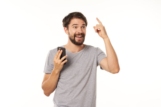 young man with thumbs up gesture isolated on white