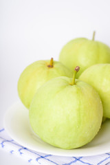 Fresh organic guava tropical fruit on white background. Healthy food high vitamin C concept