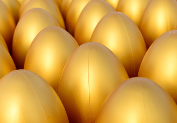 Lots of golden eggs together, close-up