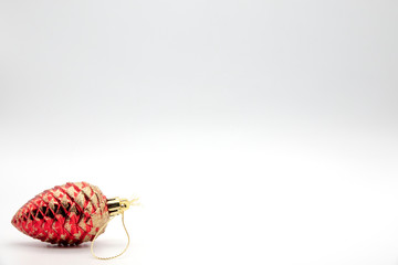 christmas ball with red ribbon on white background