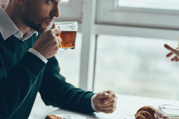 businesswoman drinking coffee in office