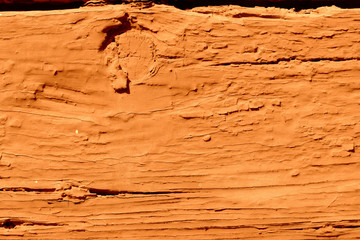 Fototapeta na wymiar Old wooden painted wall texture close-up. Abstract background orange color
