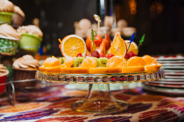 Fruit slices laid out on a fruit bowl.