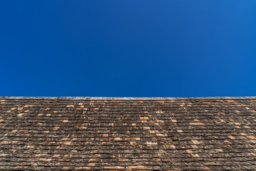 Old temple roof with blue sky