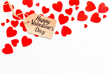 Happy Valentine's Day design. Red hearts frame with lable on white background top-down copy space