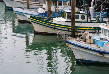 Fleet of fishing boats are lined up in San Francisco