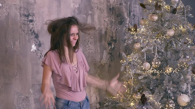 Woman Hates Christmas, Looks At Christmas Tree Pulls Her Hair Out, Mad