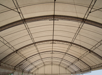 under of big tent roof