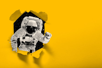 astronaut flies over the earth in space. - obrazy, fototapety, plakaty