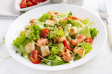 Caesar Salad with Salmon. Fish menu. Seafood - salmon.