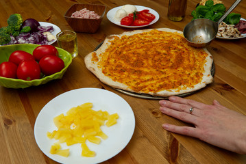 homemade pizza. ingredients, pizza base, tomato sauce. pizza in italy style
