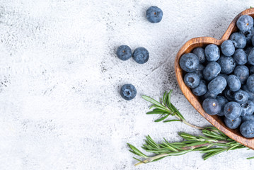 healthy eating antioxidant blueberries in a wooden bowl heart shaped